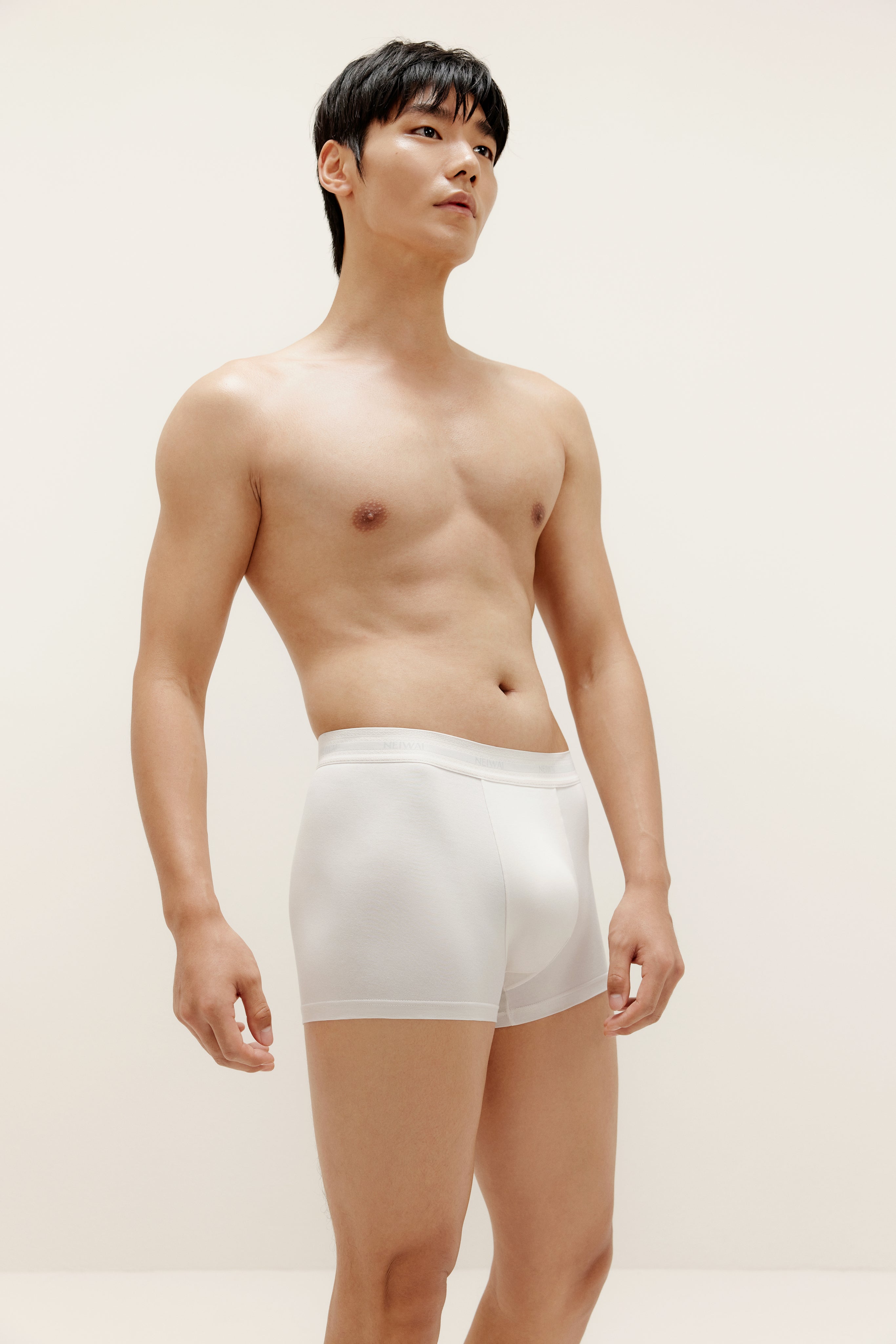 A man wearing white brief
