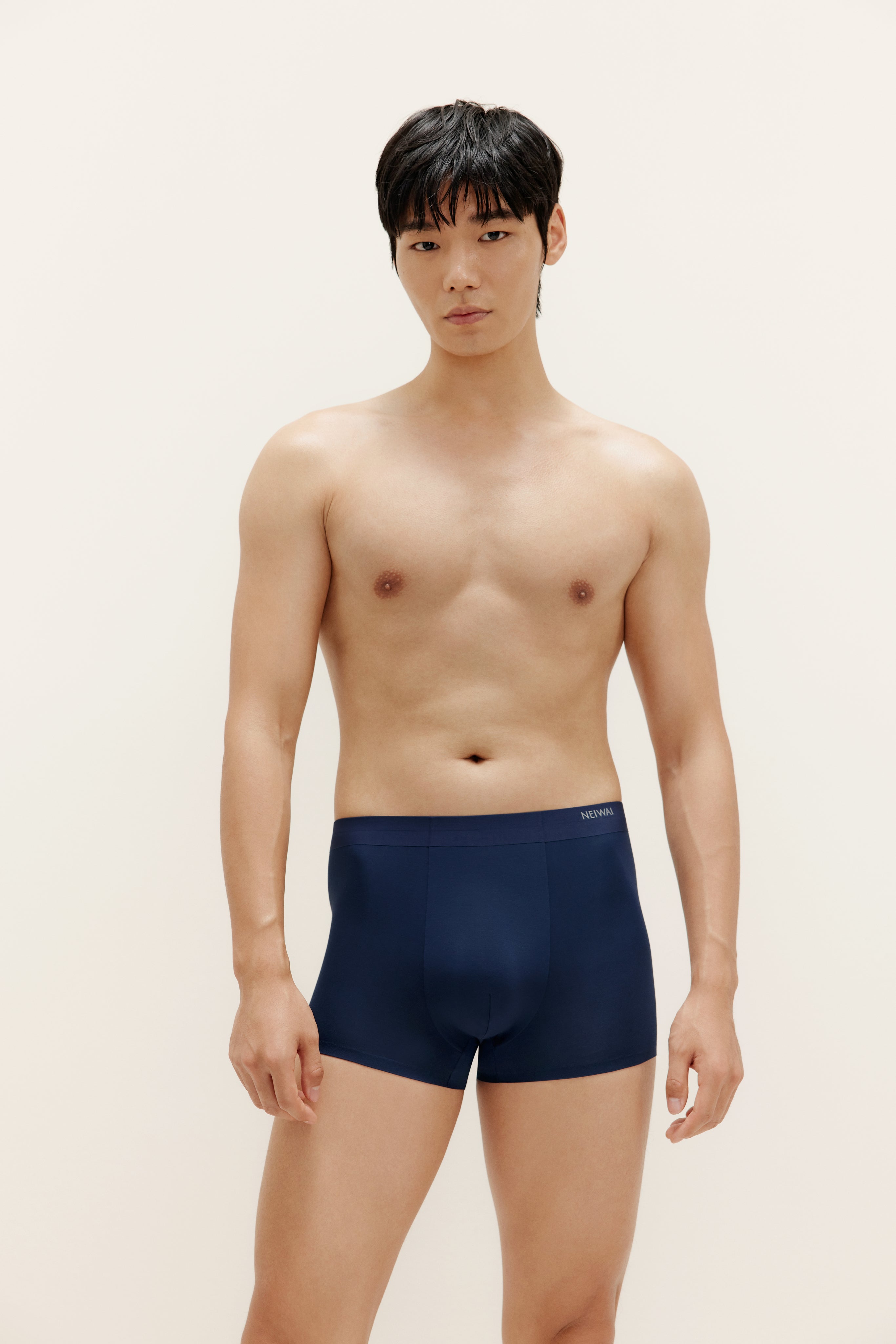 man in navy brief