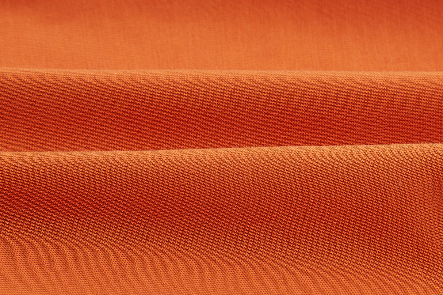 close up of the modal fabric in orange color