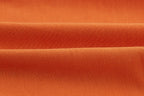 close up of the modal fabric in orange color. Sienna color. 