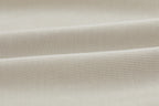 Closeup of beige fabric. Camel color.