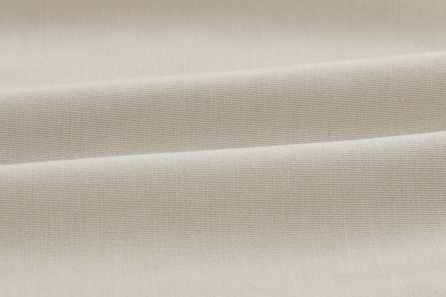 Closeup of beige fabric. Camel color.