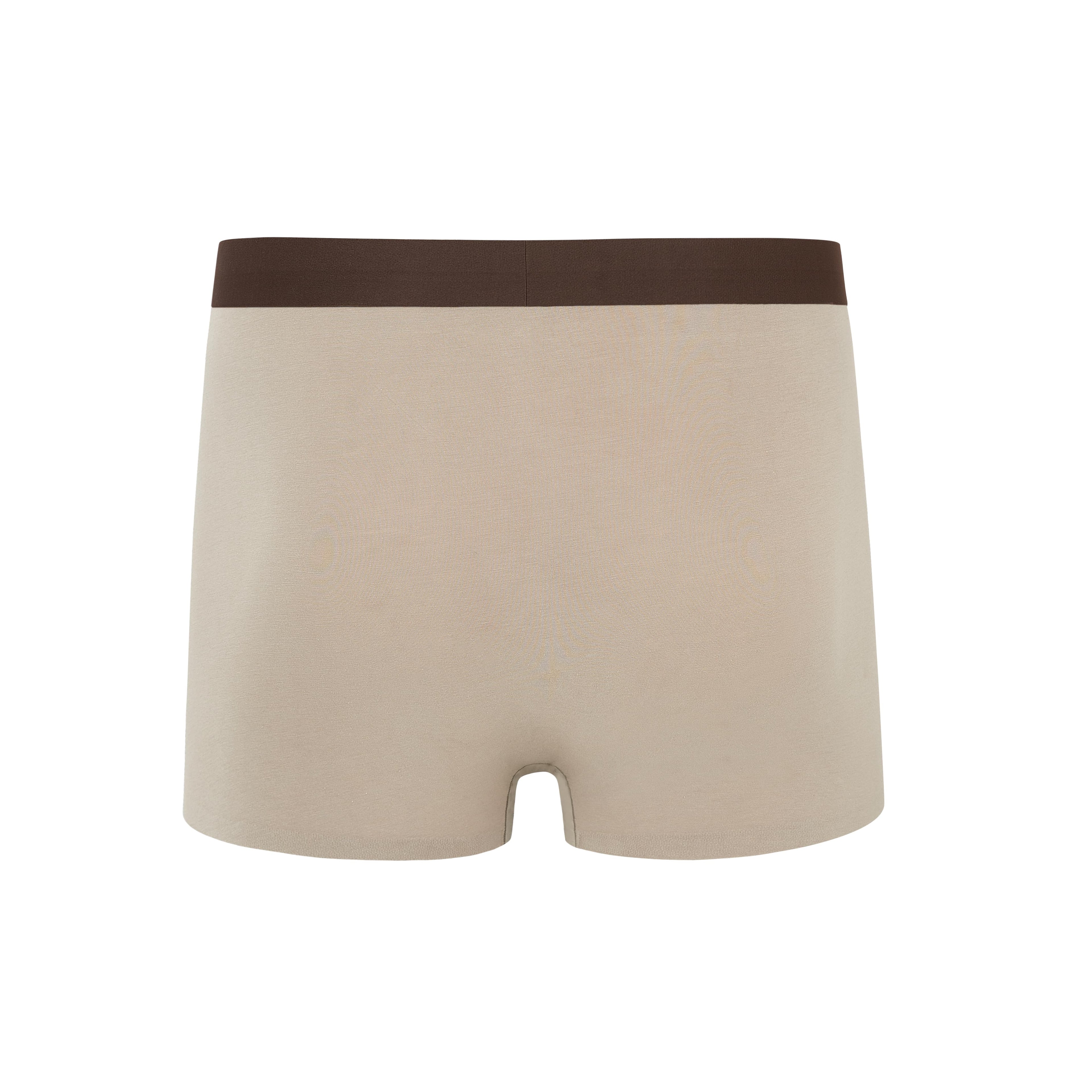 Flat lay of back of tan boxer briefs with brown waistband. Light Heather color. 