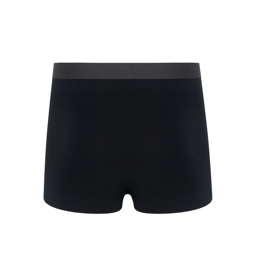 Flat lay of back of black boxer briefs with black waistband. Black color. 