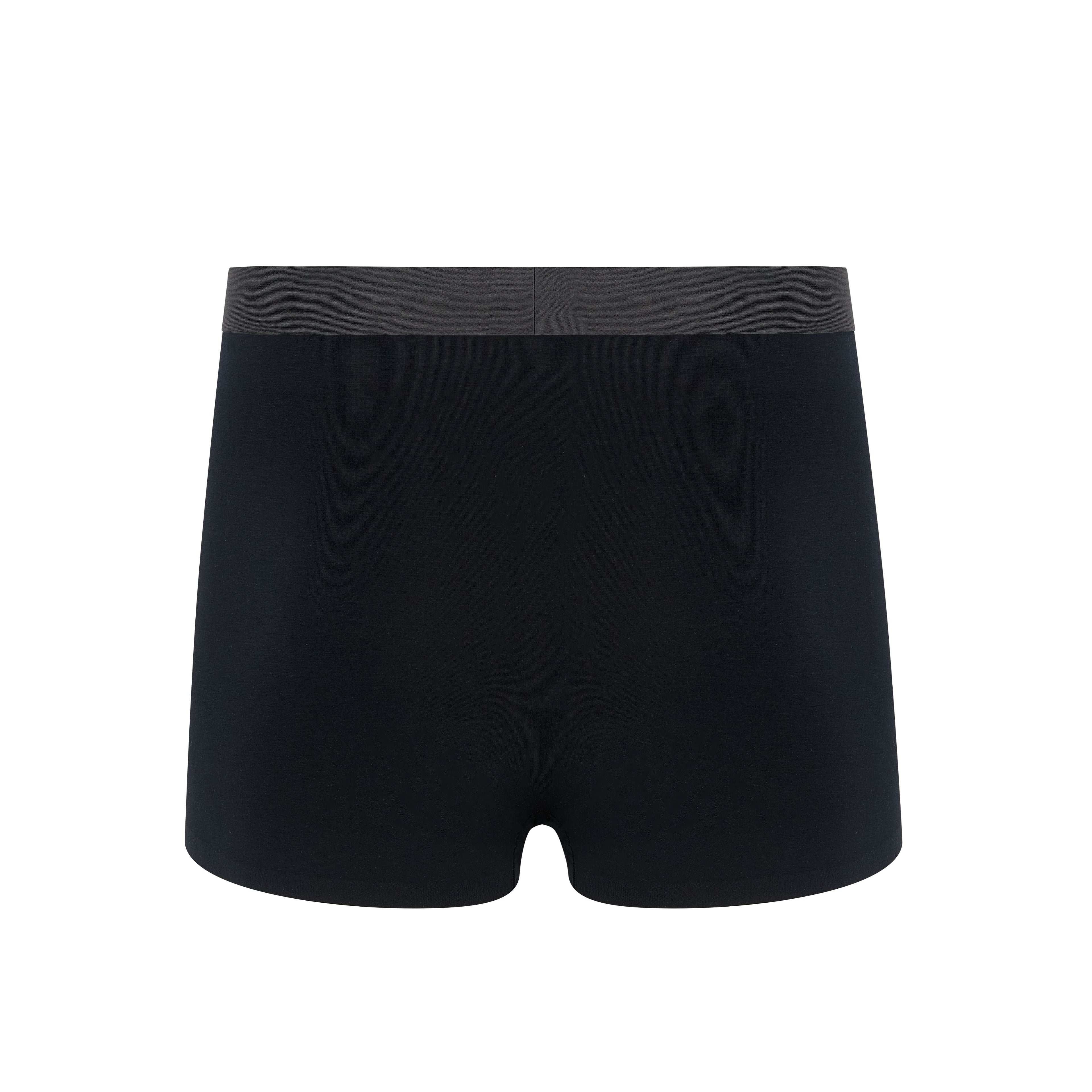 Flat lay of back of black boxer briefs with black waistband. Black color. 