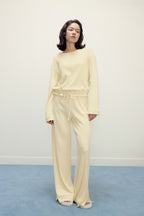 woman in yellow pajama top and pants