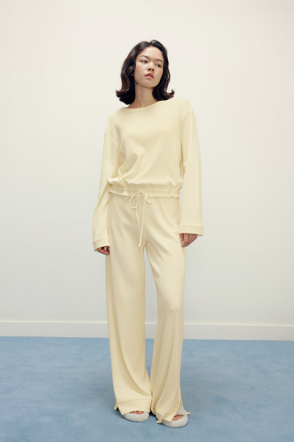 woman in yellow pajama top and pants