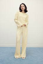 woman in yellow pajama top and pants