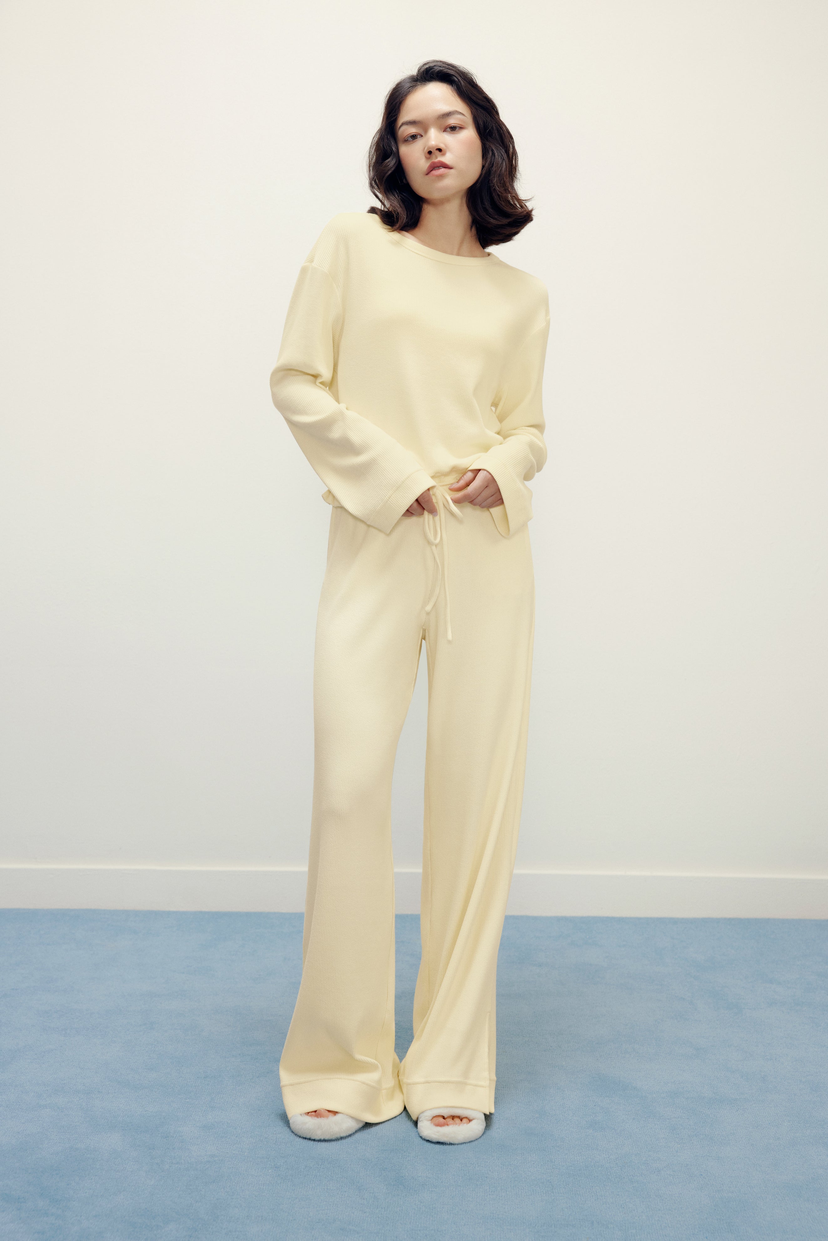 woman in yellow pajama top and pants