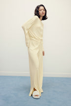 woman in yellow pajama top and pants