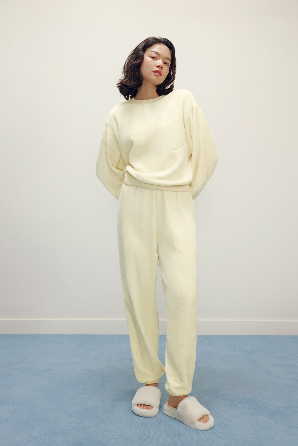 Women with cream color fluffy loungewear set