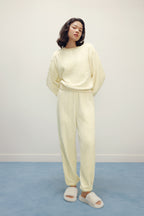 Women with cream color fluffy loungewear set