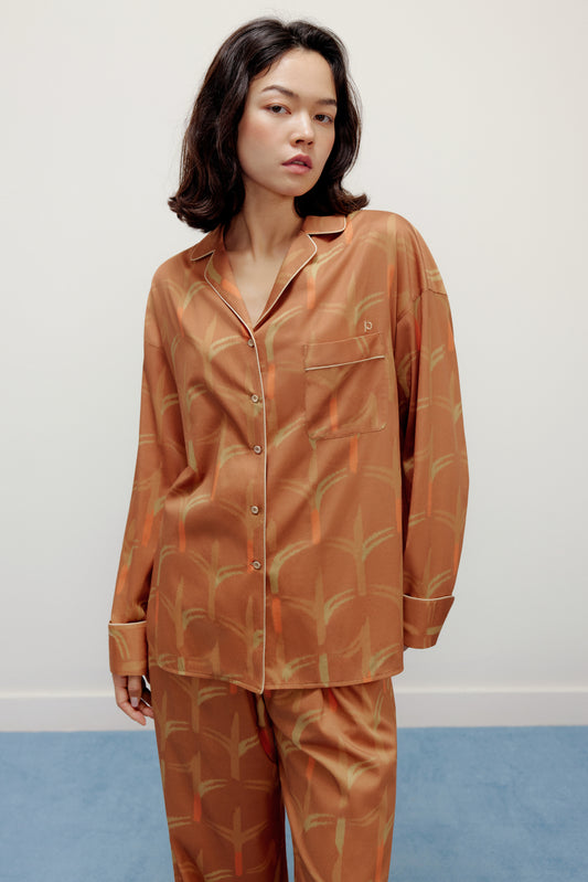 woman wearing brown pajama set