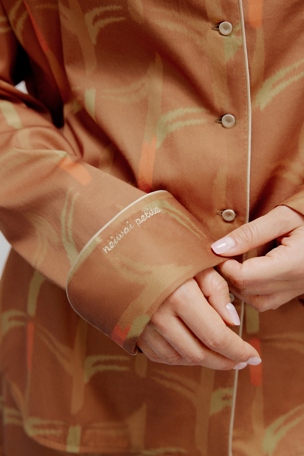 showcasing the sleeve of the pajama