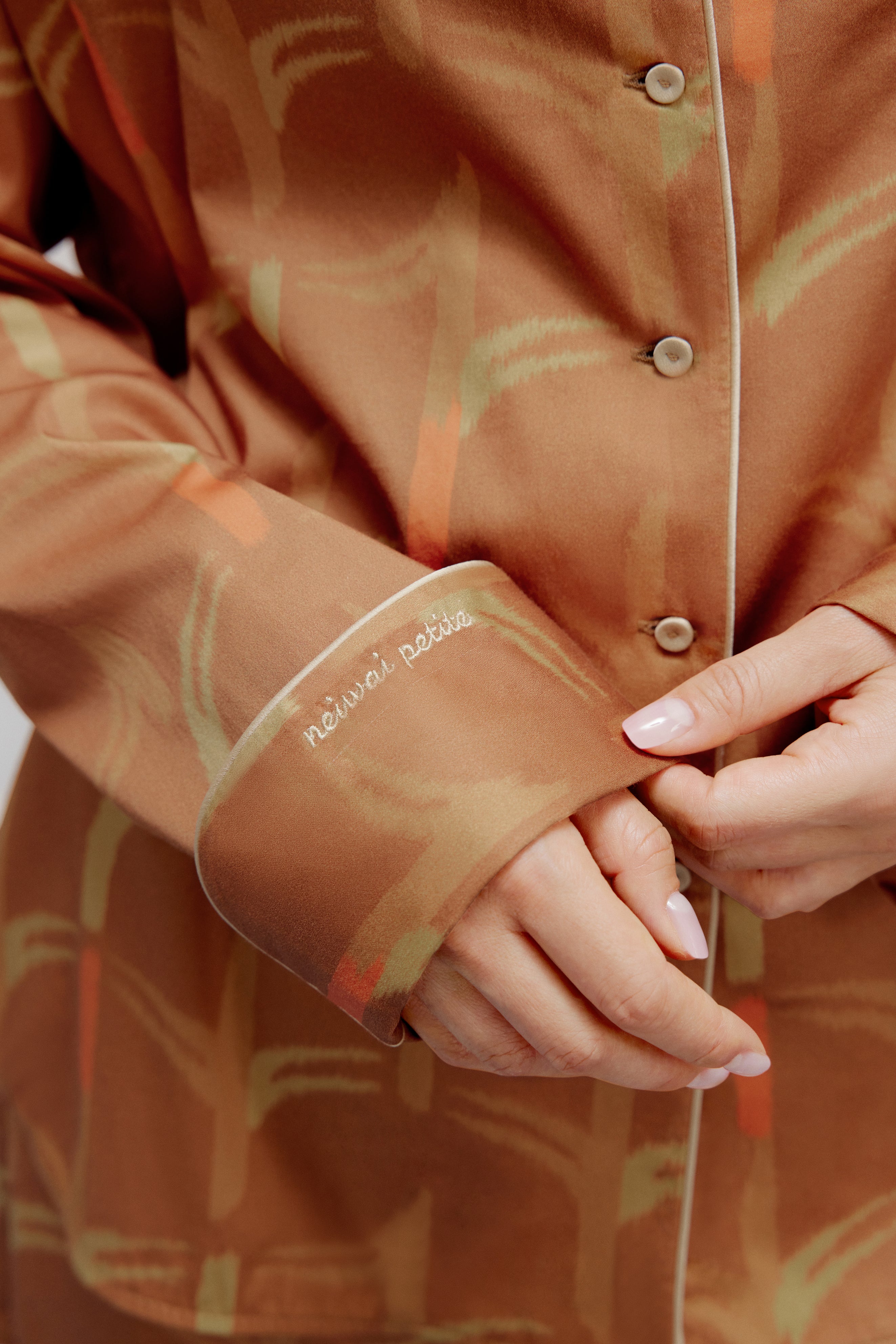 showcasing the sleeve of the pajama