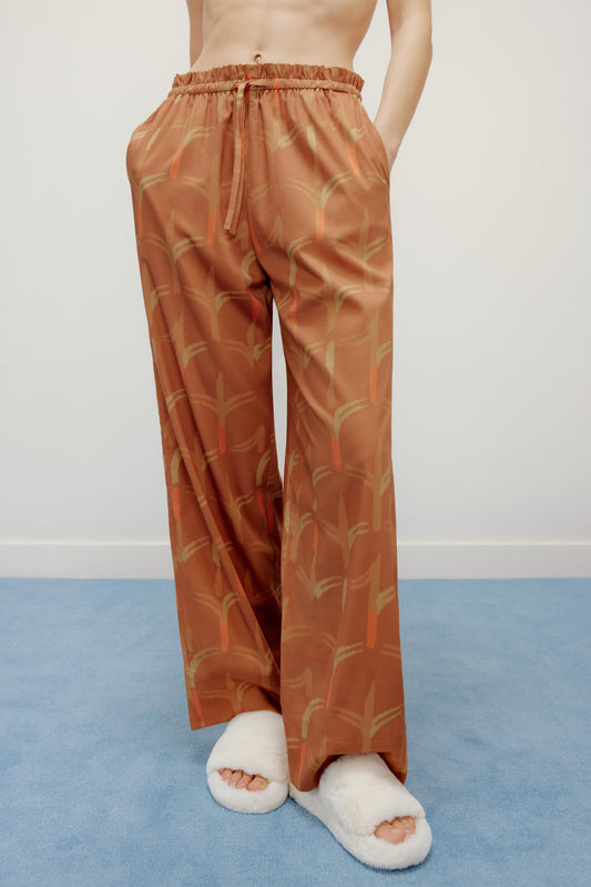 female model waring brown pajama pants
