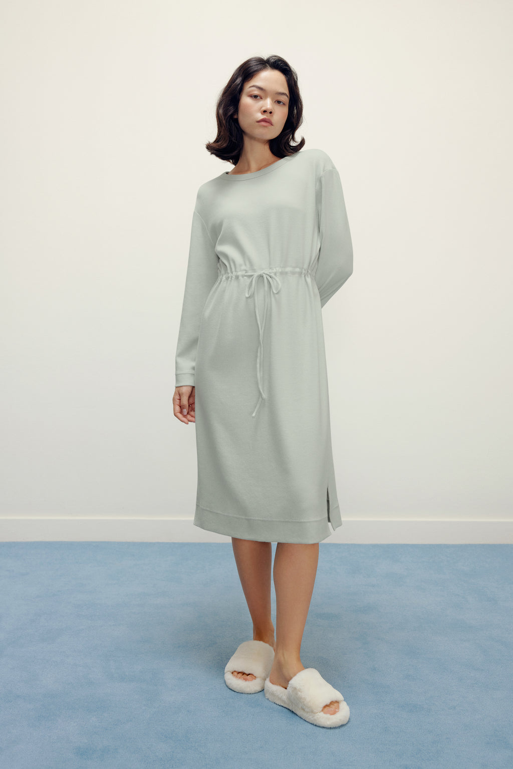 woman in mint pajama longe sleeve dress with waist drawstring
