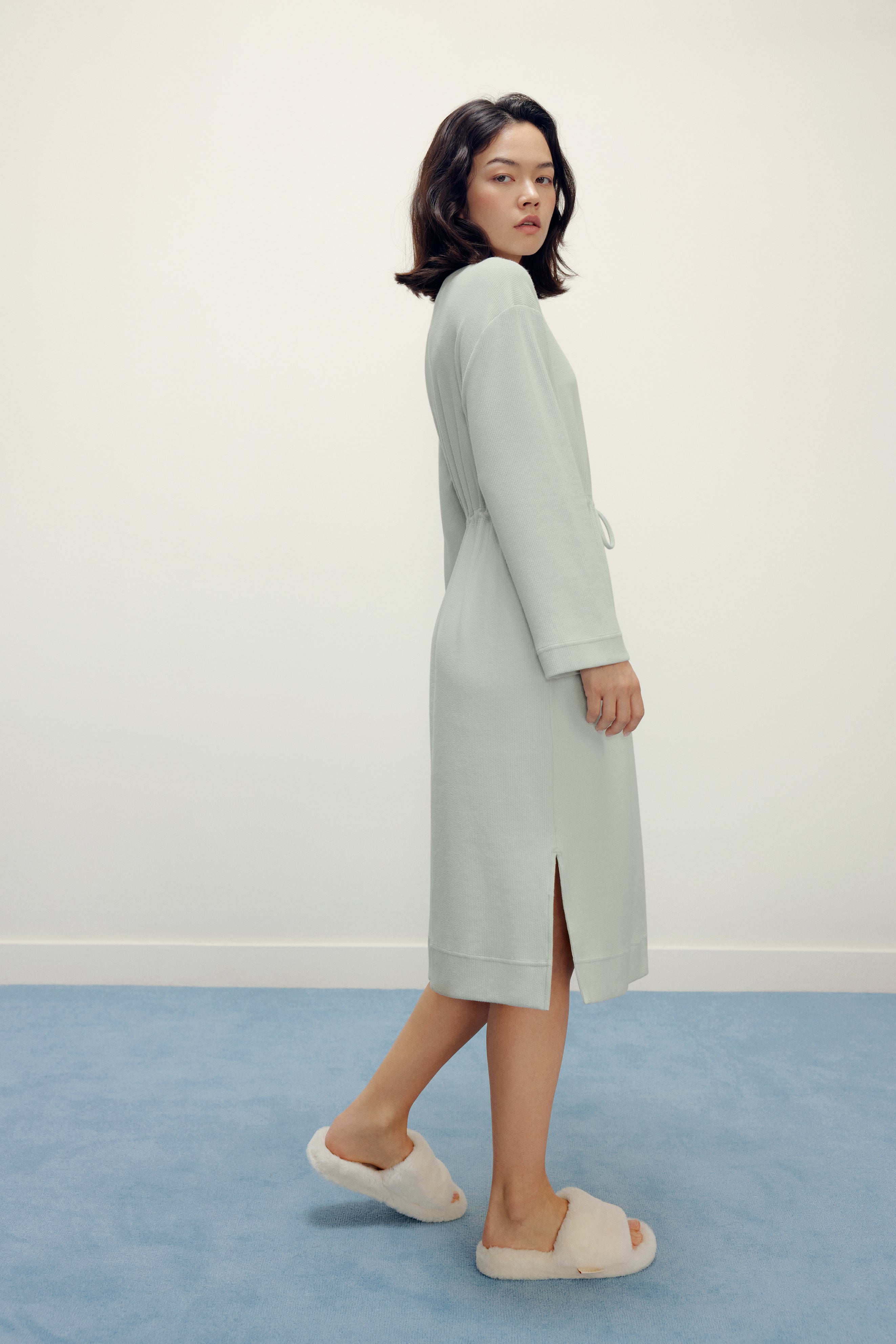 woman in mint pajama longe sleeve dress with waist drawstring