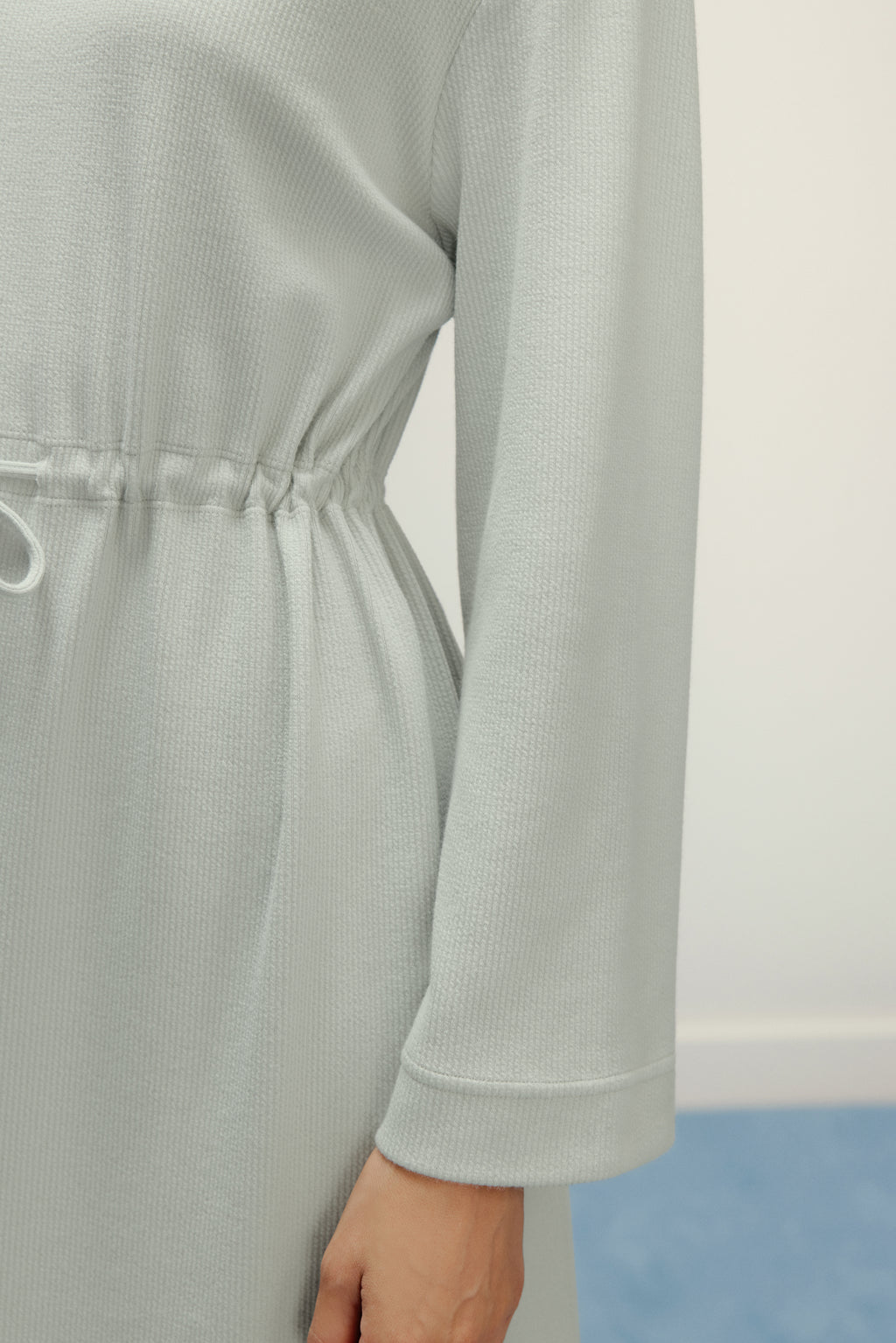 close up of dress at the waist line
