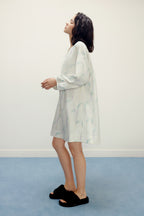 woman wearing a ruched dress