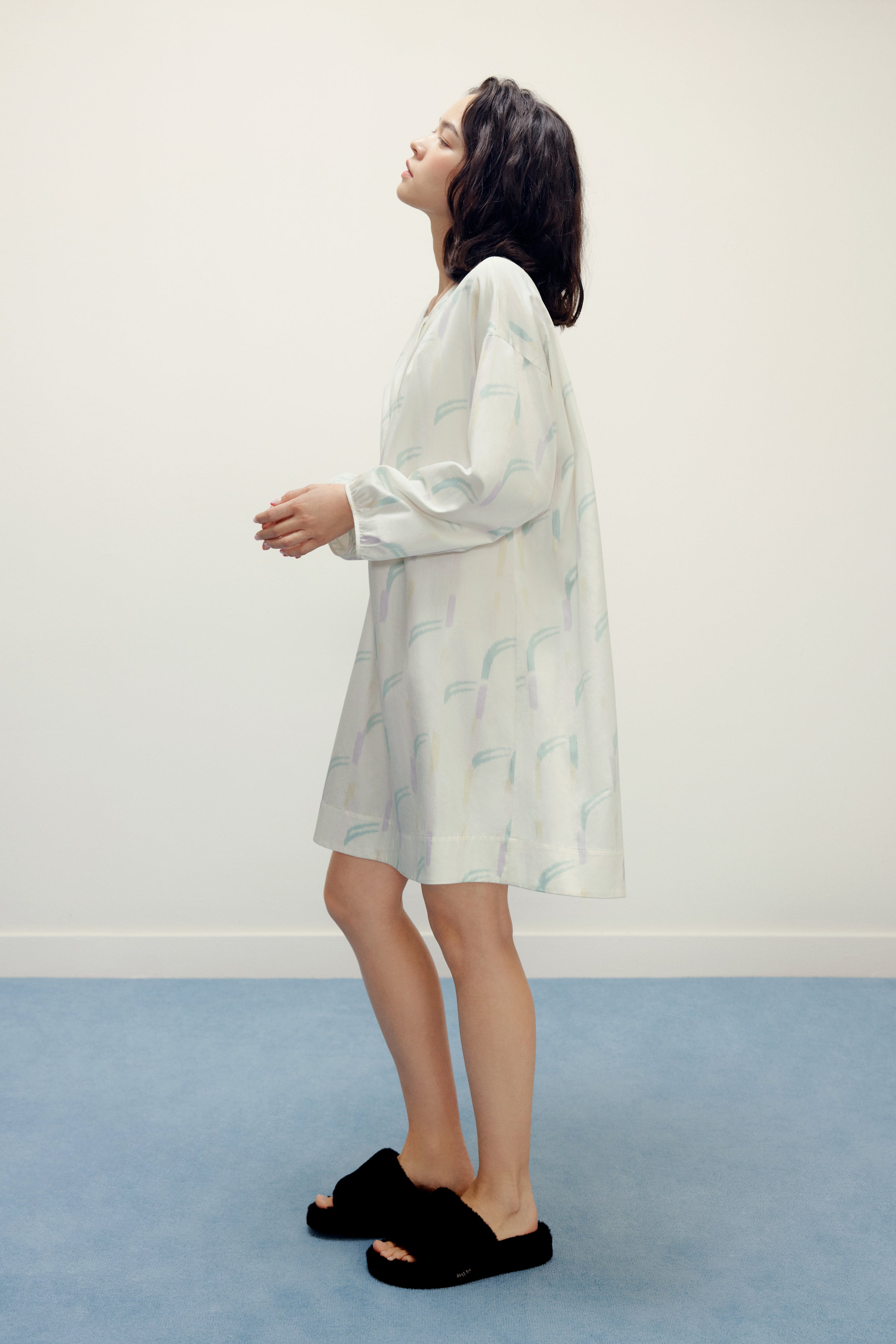 woman wearing a ruched dress