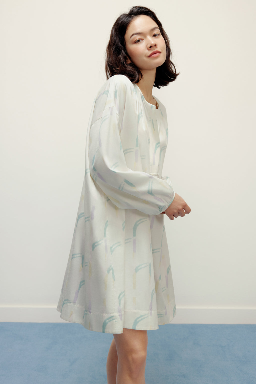 woman wearing a ruched dress