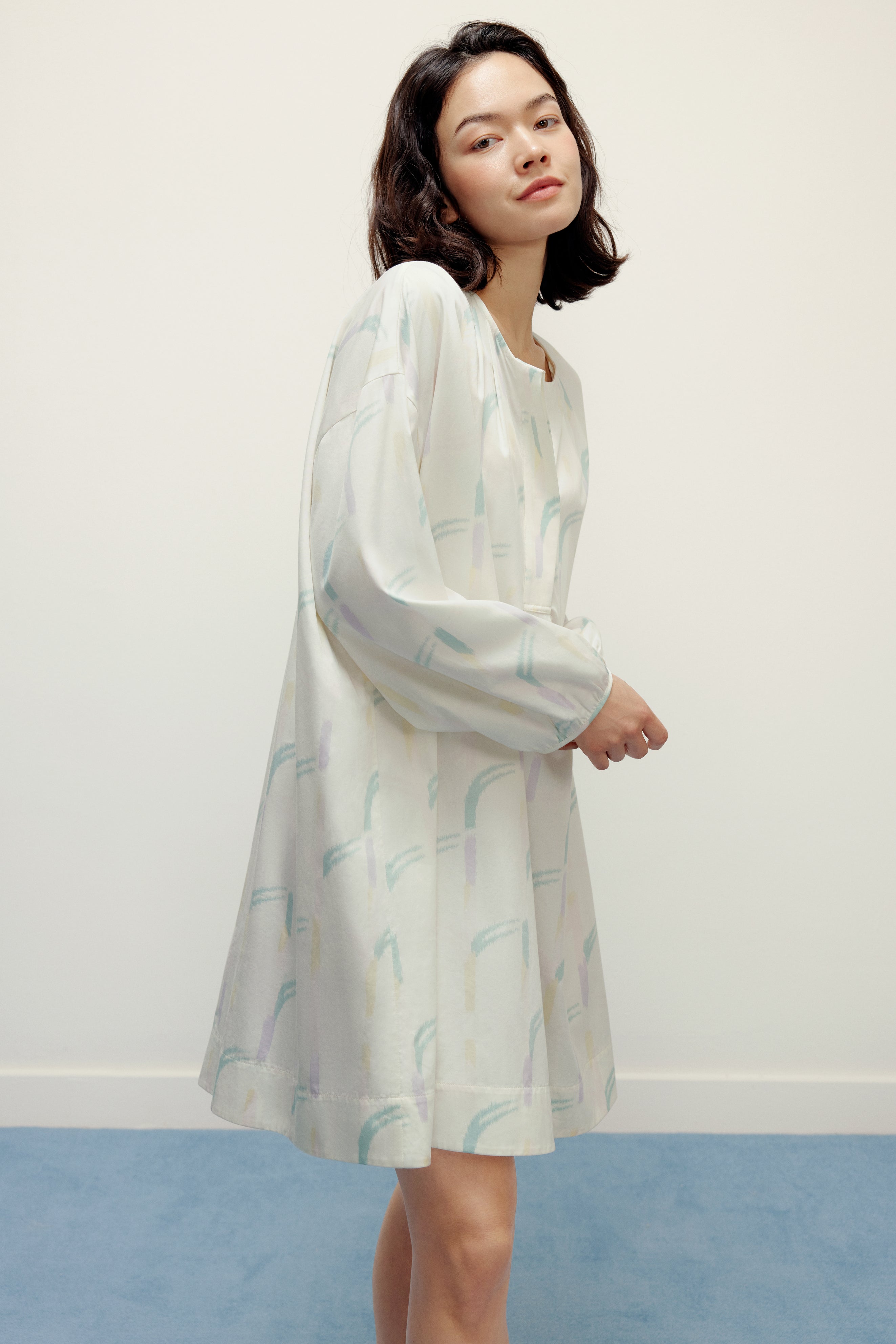 woman wearing a ruched dress
