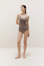 woman in brown camisole and brief