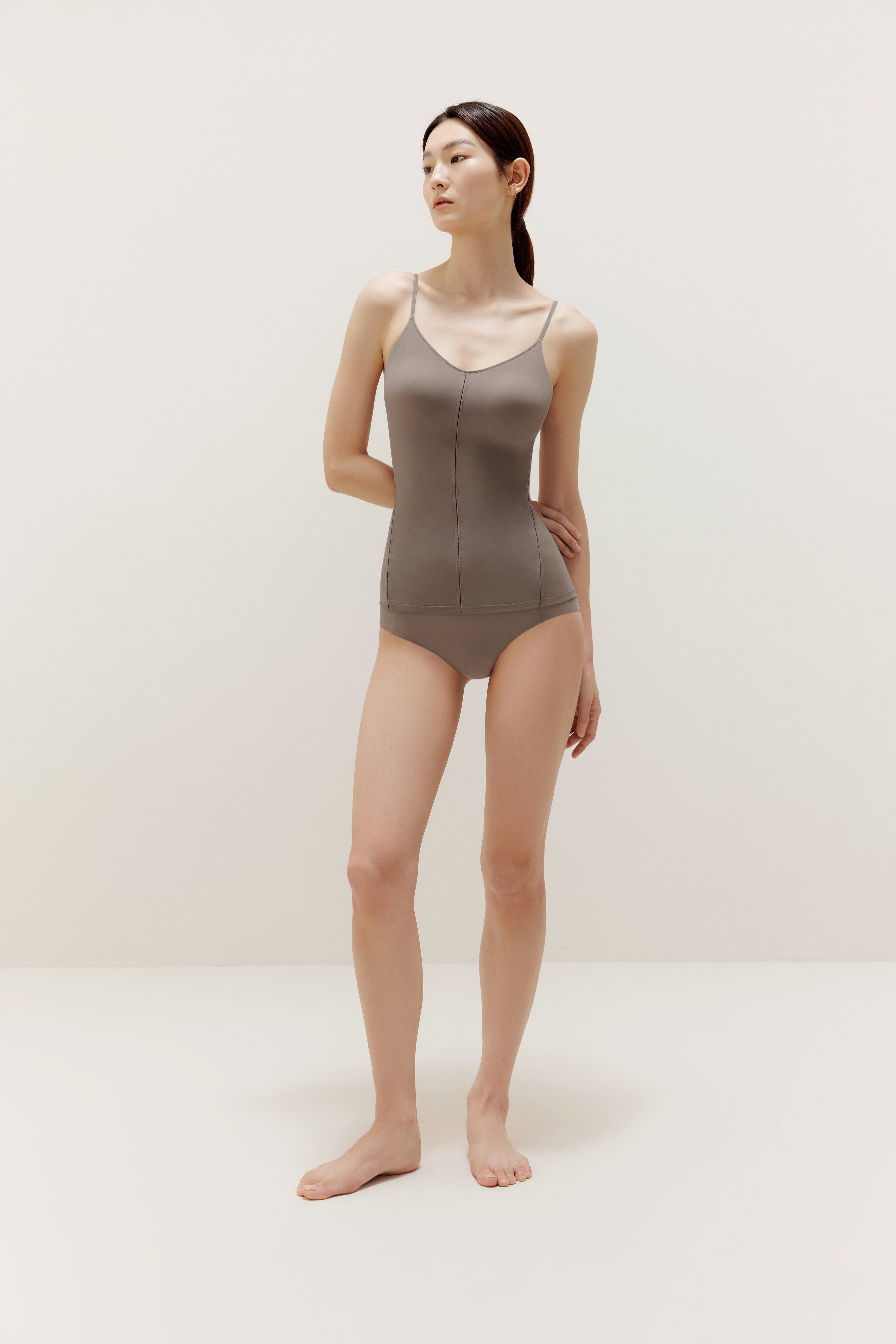 woman in brown camisole and brief
