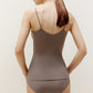 back of woman in brown camisole and brief