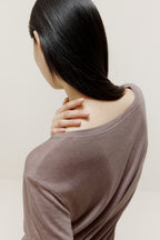 back of the short sleeve drape-front sweater