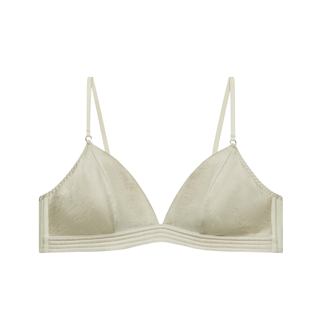 flat lay image of cream bra