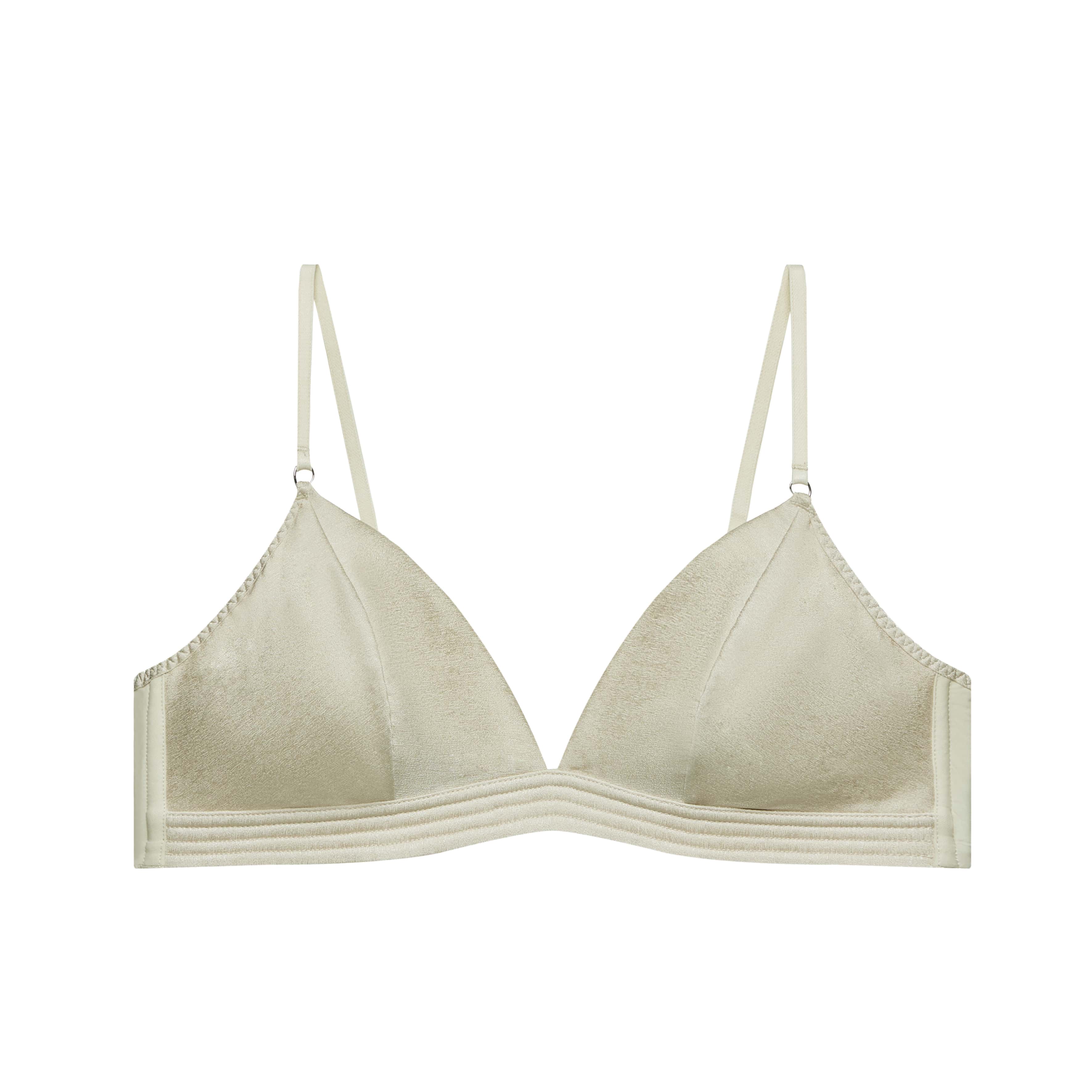 flat lay image of cream bra