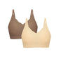 Flat lay image of beige and light brown bras