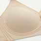 Closeup flat lay image of beige bra with plunge neckline and center cutout