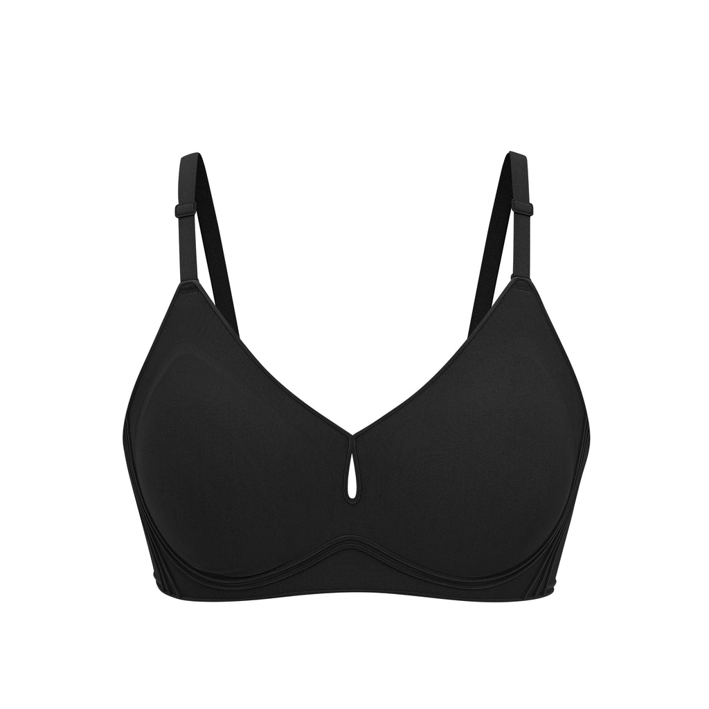 Flat lay image of black bra with plunge neckline and center cutout. Black color. 