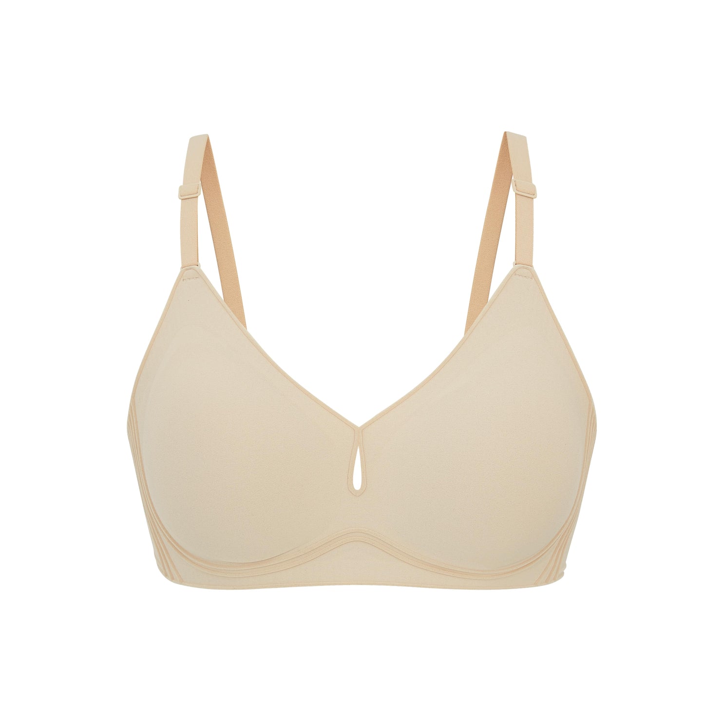 Flat lay image of beige bra with plunge neckline and center cutout