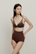 woman in mesh bra
