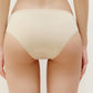 back of woman in tan brief