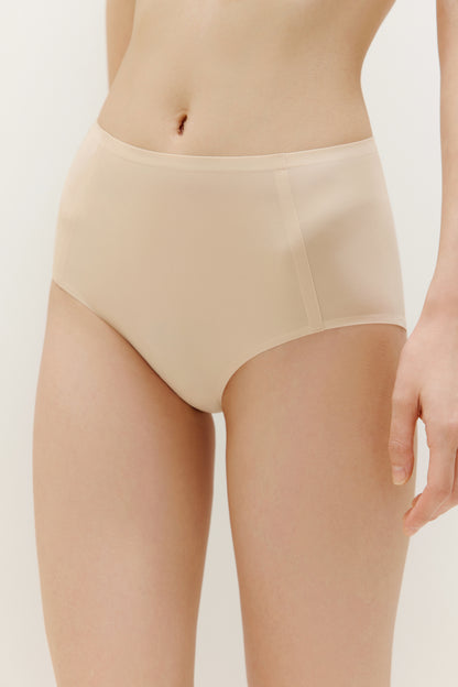 woman in beige brief