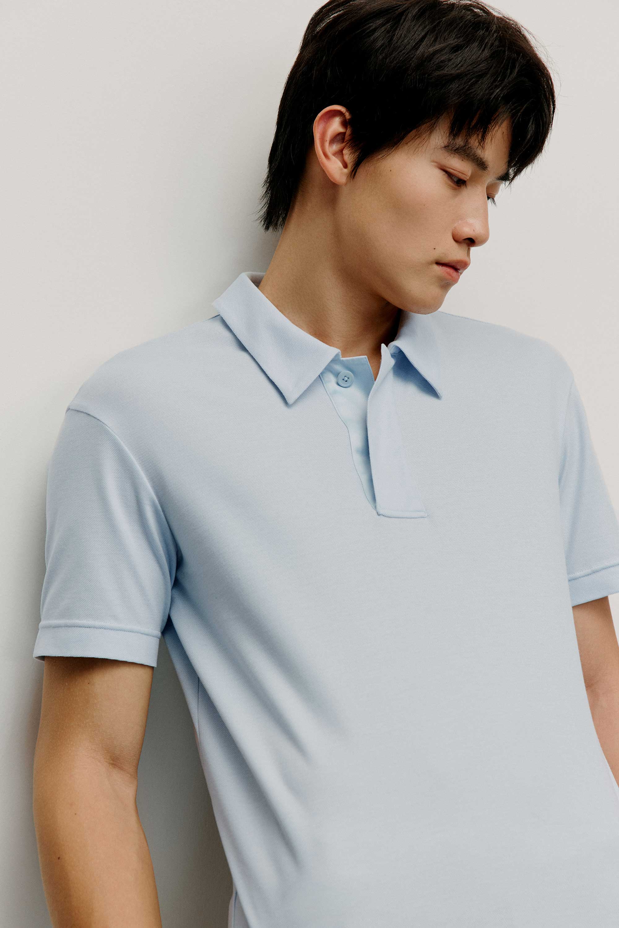 Man in blue polo shirt