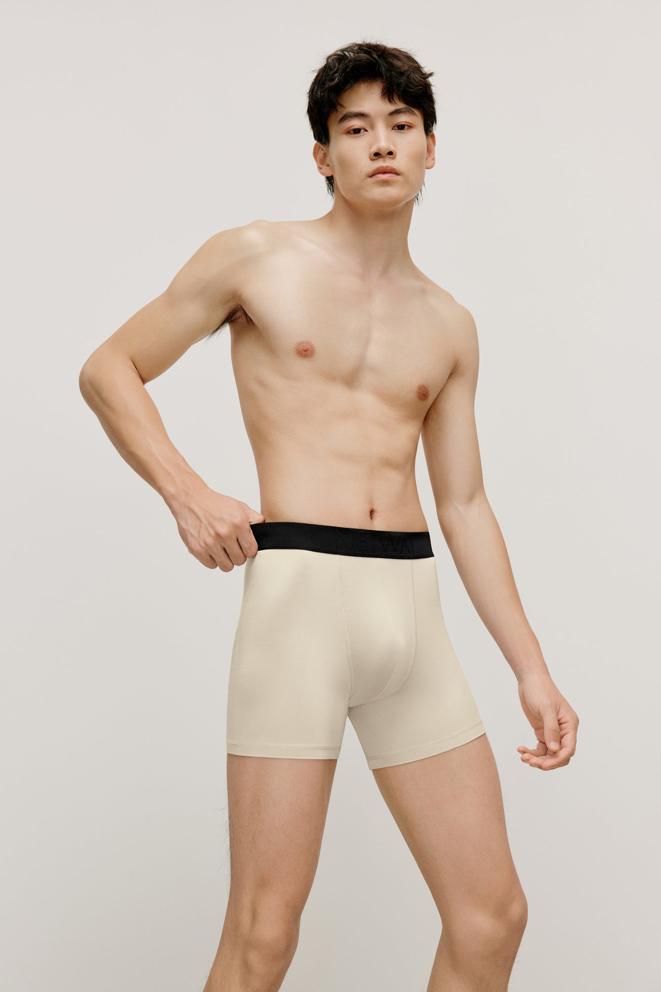 man in nude brief