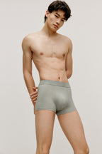 man in olive brief
