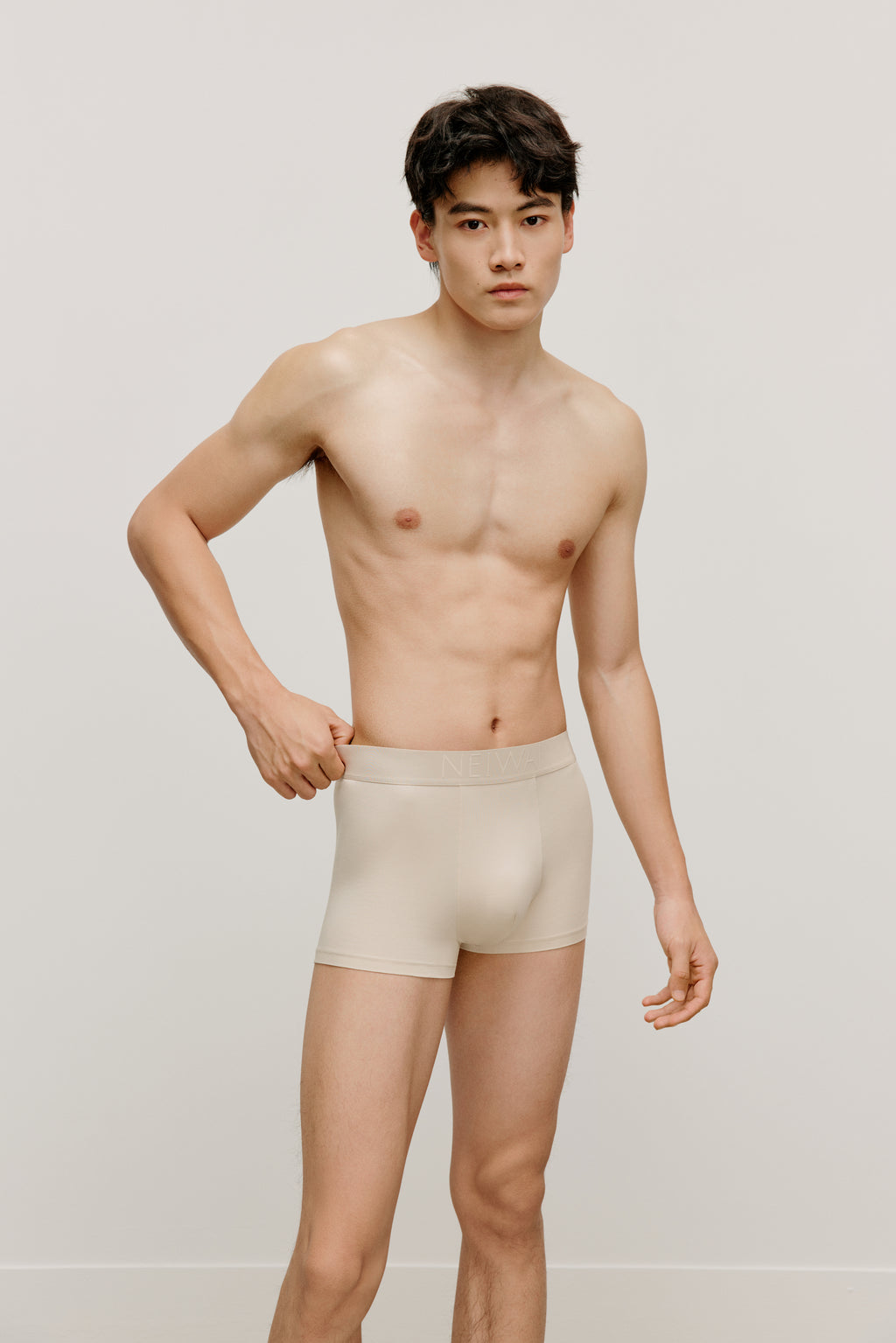 man in beige brief