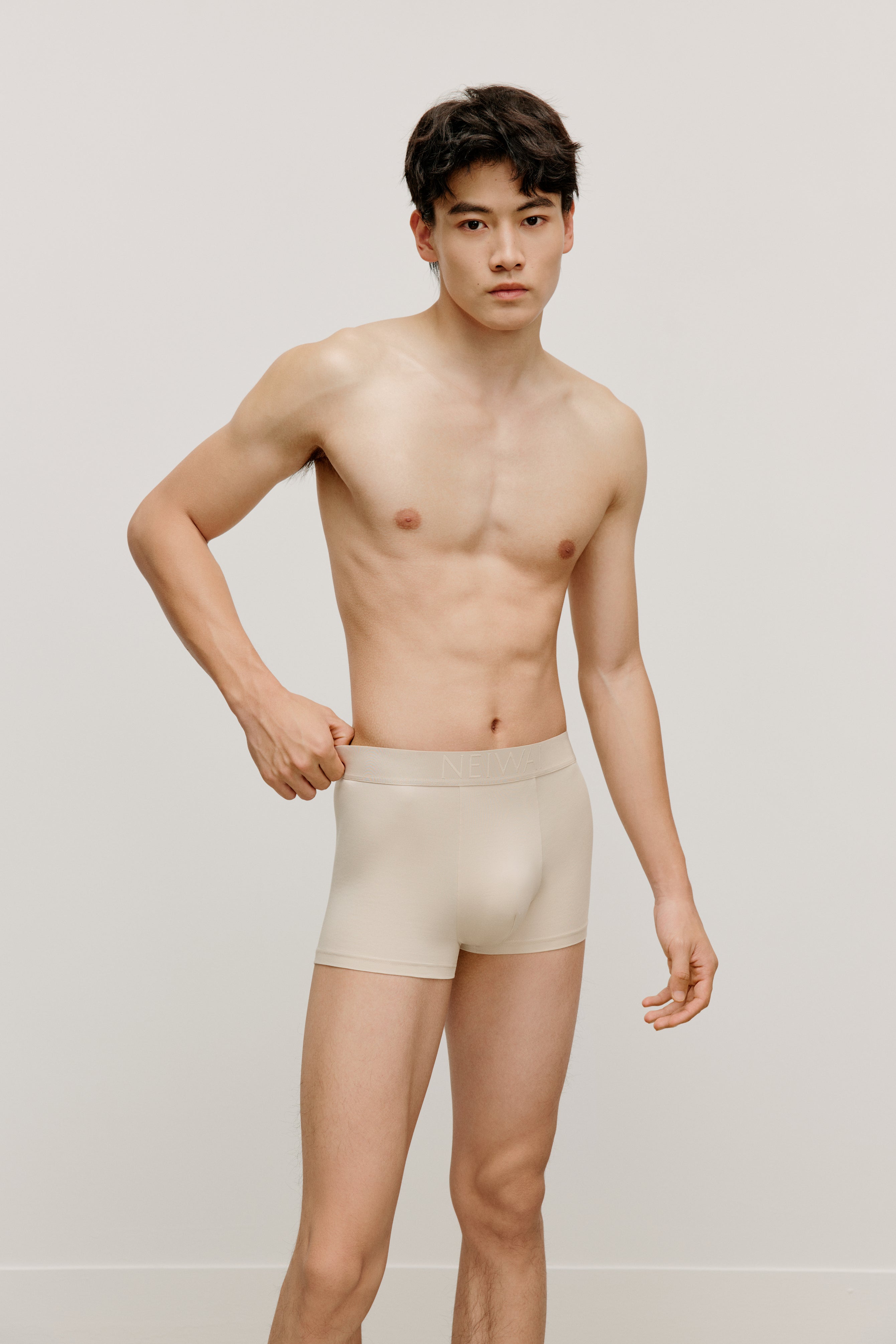 man in beige brief