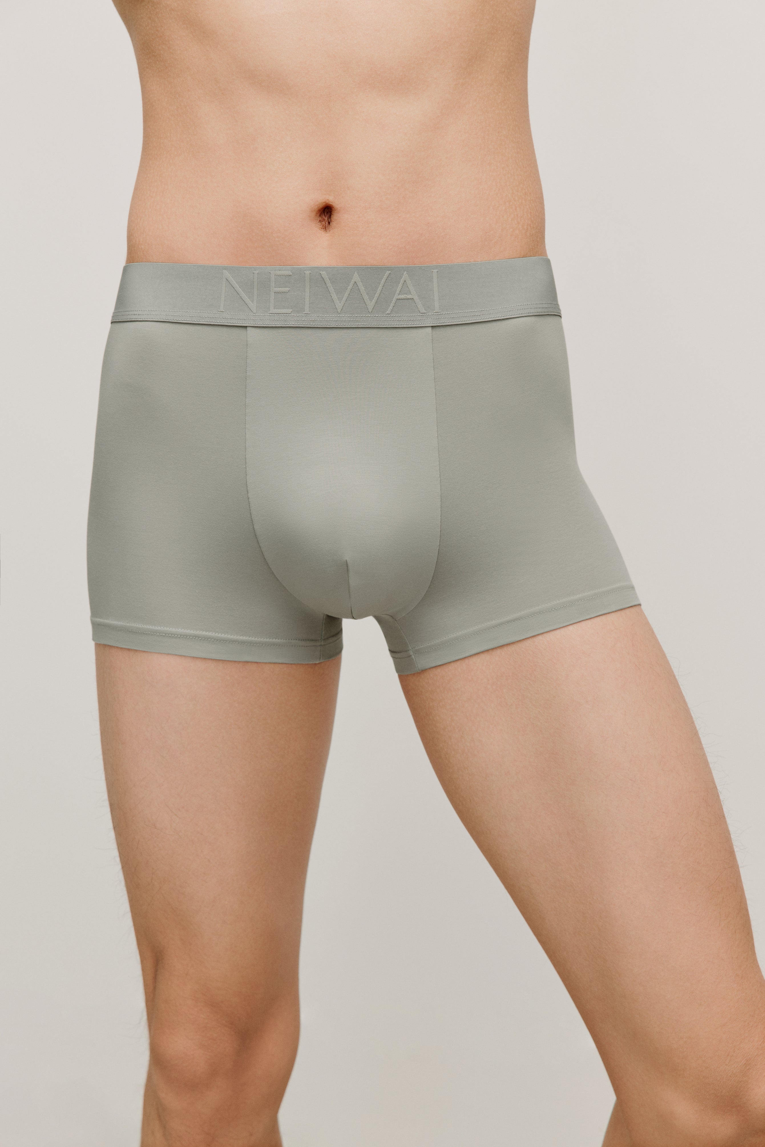 man in olive brief