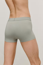 back of man in olive brief