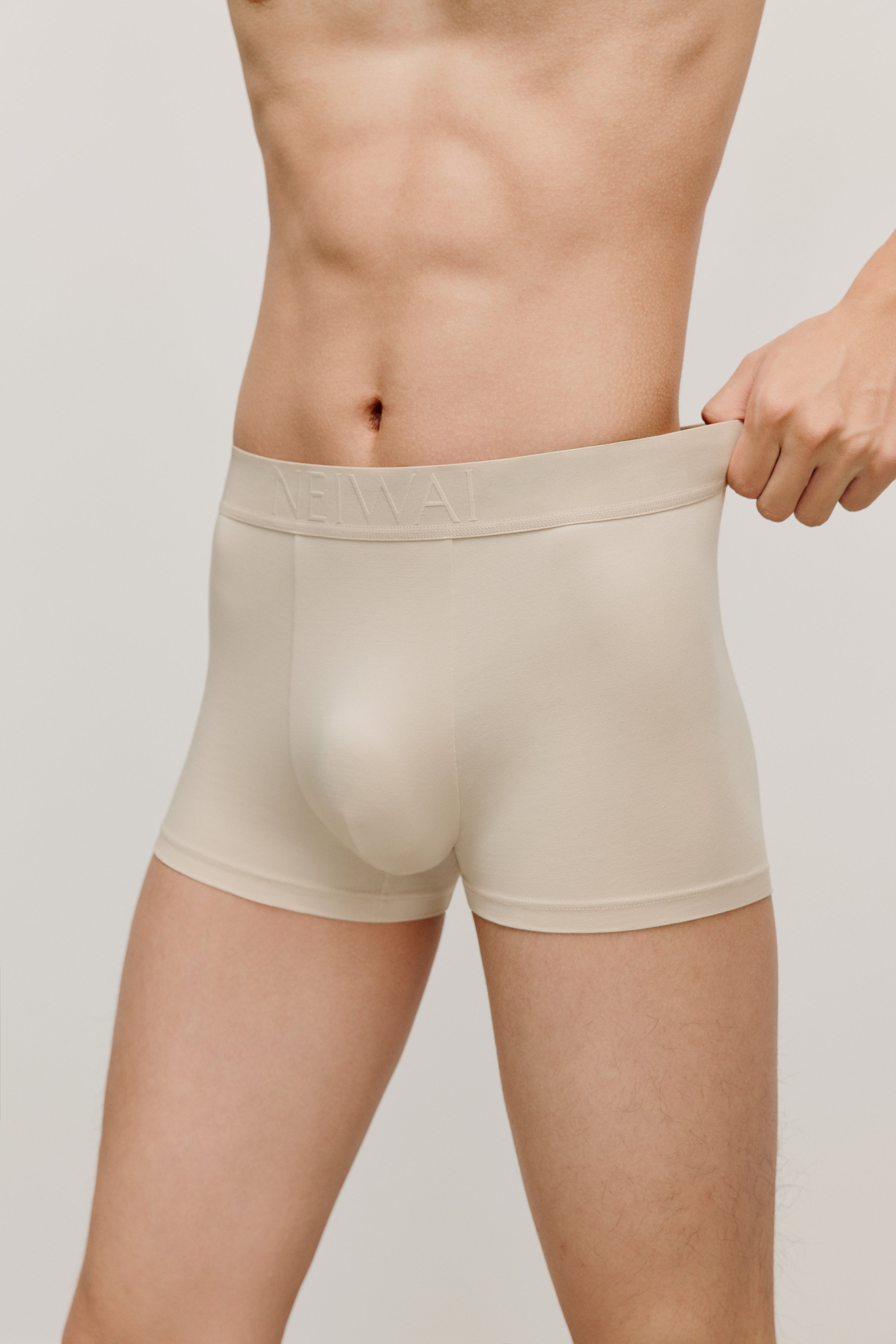 man in beige brief