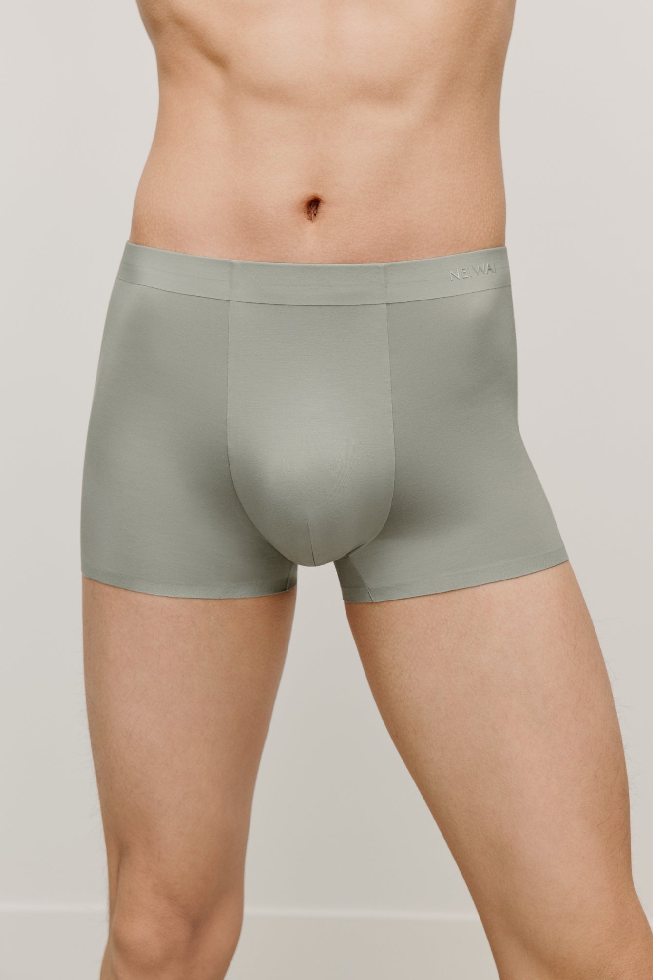 a man wearing a green brief
