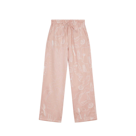 flat lay image of pink pajama pants with white sketches